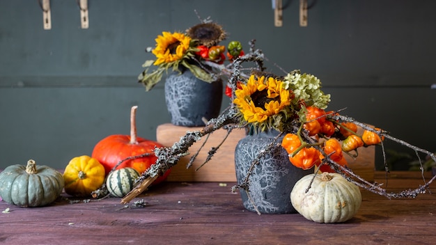 Autumn still life with pumpkins and flowers