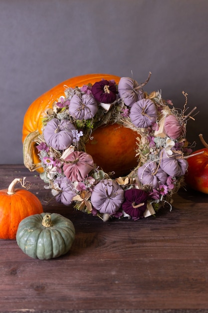 Autumn still life with pumpkins and flowers