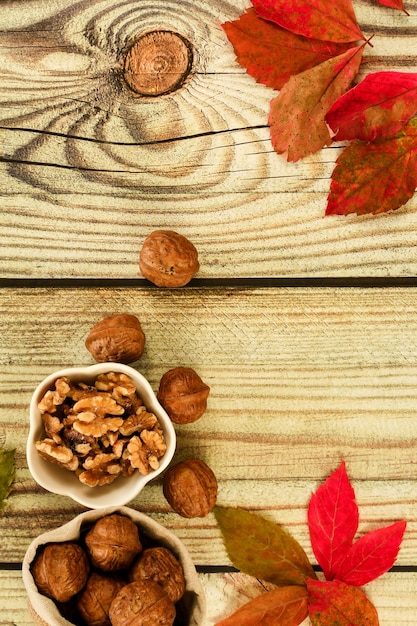 Autumnal natural wooden background with autumn decoration