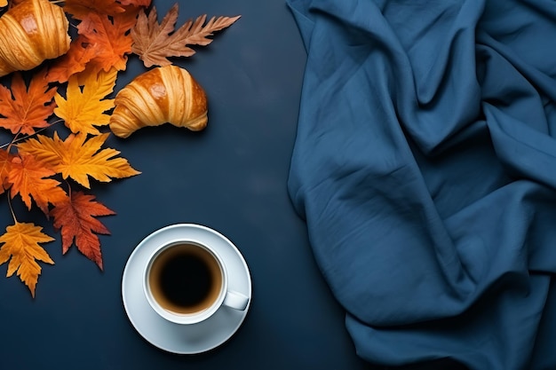 AutumnInspired Work from Home Een serene blauwe business flat lay met laptop croissants en thee