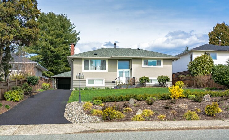 Average residential house with landscaped front yard in canada