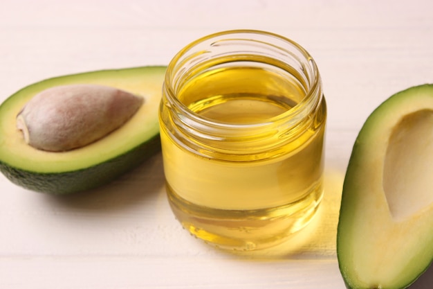 Avocado and avocado oil close up on the table