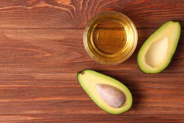 Avocado and avocado oil close up on the table