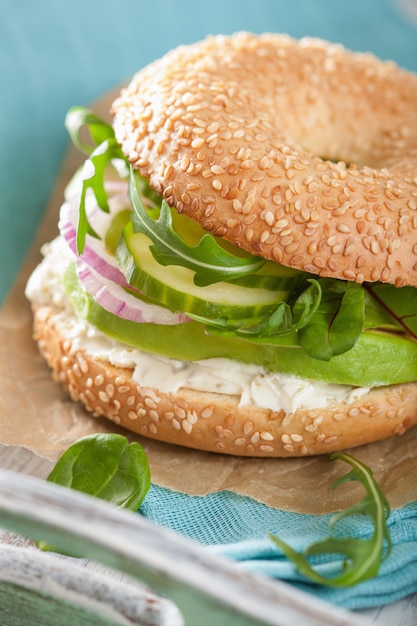 Avocado Bagel with cream cheese, onion, cucumber and arugula