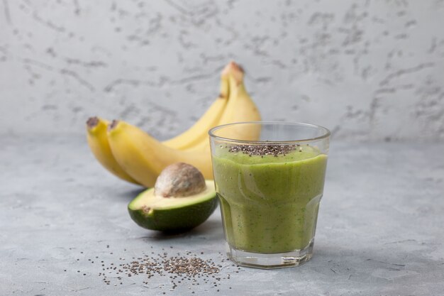 Avocado and banana smoothie in glass jar