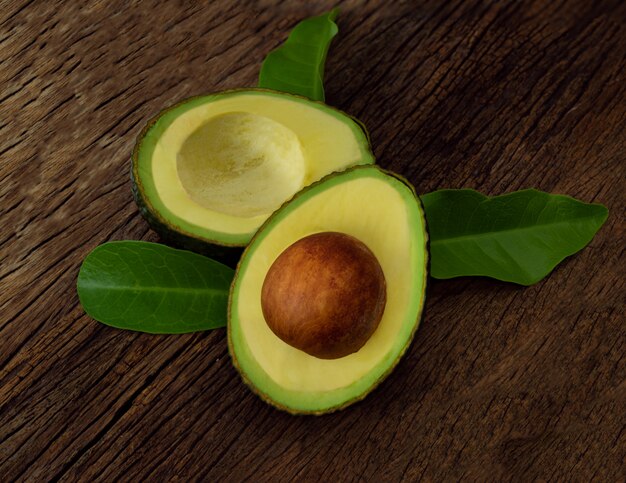 Avocado on a brown wooden floor