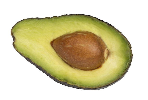 Avocado fruit cut in half with seed
