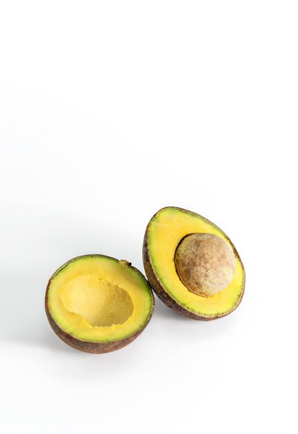 Avocado fruit on white