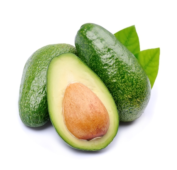 Photo avocado fruits closeup on white.