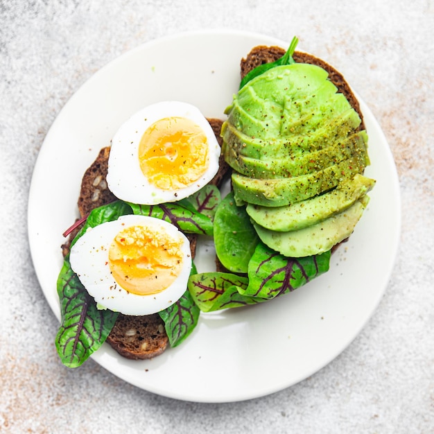 avocado sandwich egg bread breakfast open sandwich fresh meal fastfood diet snack on the table