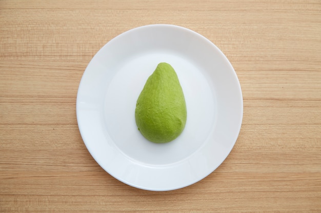 Avocado on white plate Healthy