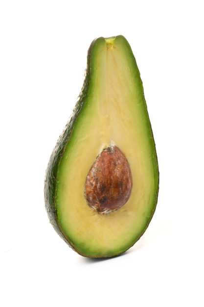 Photo avocado whole fruit and slices, isolated on a white background