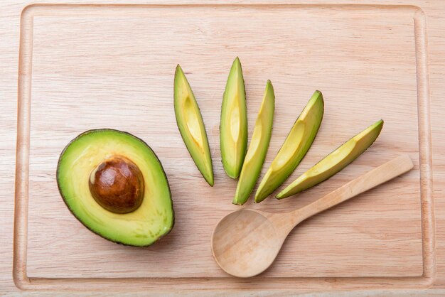 Avocado on wood table Healthy food concept