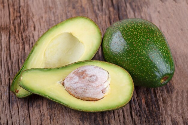 Avocado on a wooden background