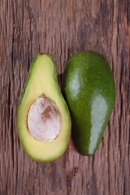 Avocado on a wooden background