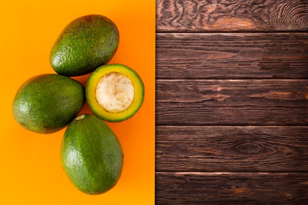 avocado on the wooden surface 