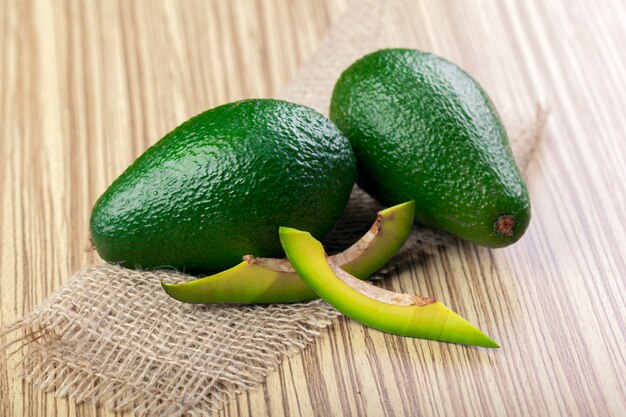 Avocado on a wooden surface