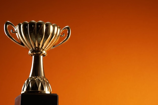 Award trophy against orange background