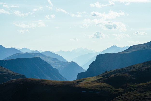 Awesome aerial view to great mountains in distance behind deep gorge Scenic mountain landscape