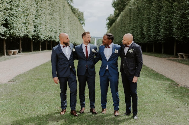 Awesome groom and groomsmen getting crazy in the forest and performing tricks on a wedding day.