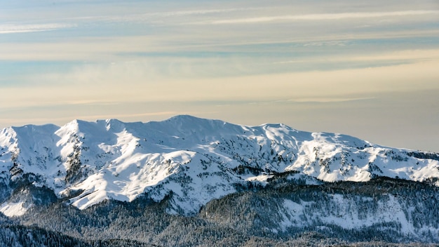 Awesome view of the Caucasus mountains covered by snow in the ski resort of Krasnaya Polyana Russia