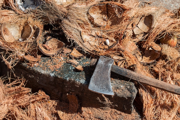 Ax on the background of coconut rind