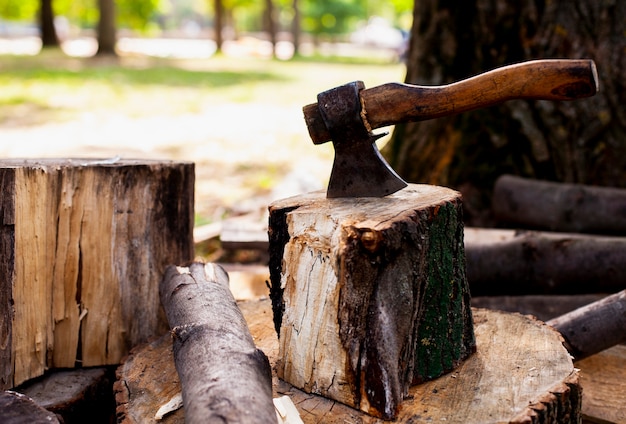 Axe stuck in a wooden log