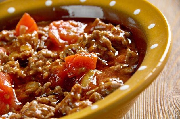 Axoa - traditional dish of the Basque country.minced beef with vegetables