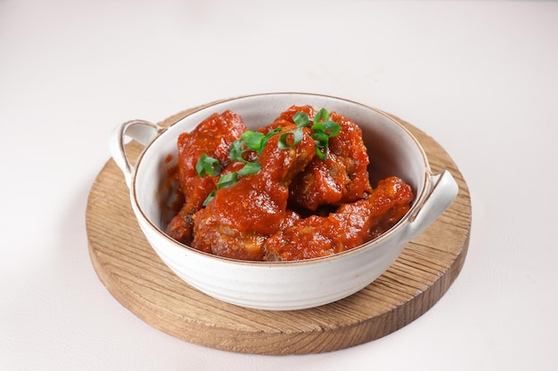 Ayam Masak Merah or Chicken Cooked  in Dried Chillies Sambal is a Malay Traditional Dish.