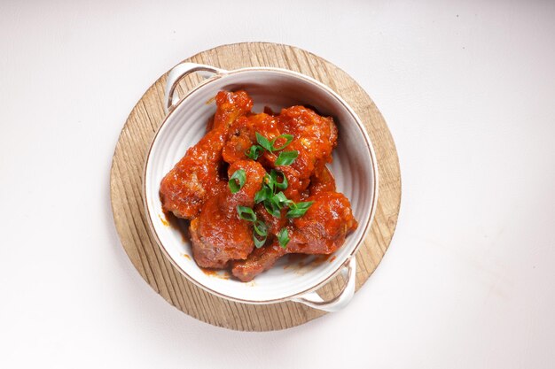 Ayam Masak Merah or Chicken Cooked  in Dried Chillies Sambal is a Malay Traditional Dish.