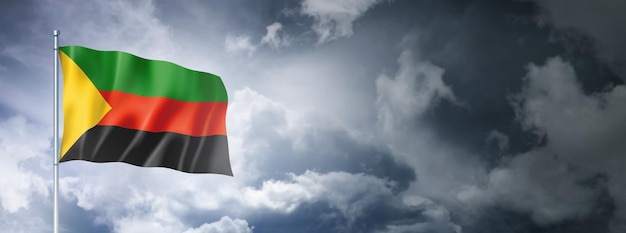 Azawad MNLA flag on a cloudy sky