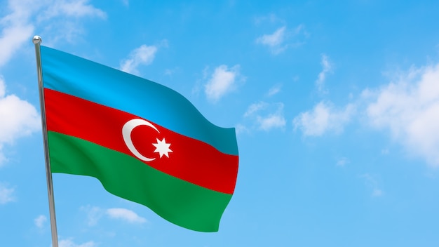 Azerbaijan flag on pole. Blue sky. National flag of Azerbaijan