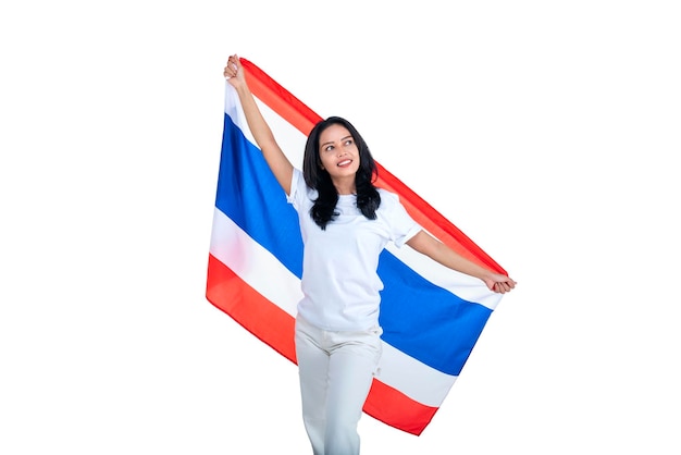 Aziatische vrouwen vieren de onafhankelijkheidsdag van Thailand op 5 december door de Thaise vlag vast te houden