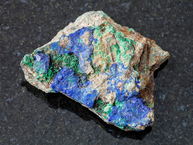 Azurite and Malachite on raw stone on dark