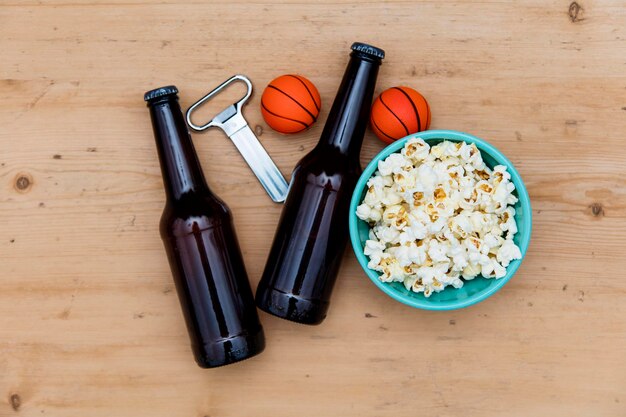 Baasketball match party Beer bottle with basketball and popcorn