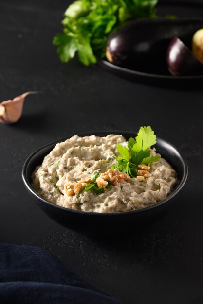 Baba ganoush levantine cuisine appetizer from baked eggplant with parsley garlic and olive oil close