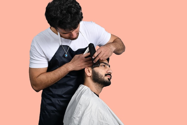 baber shaving another man indian paistani model