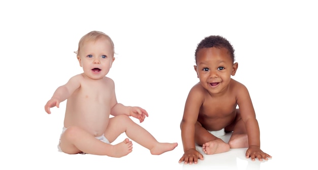 Babies playing and wearing diapers isolated on a white background