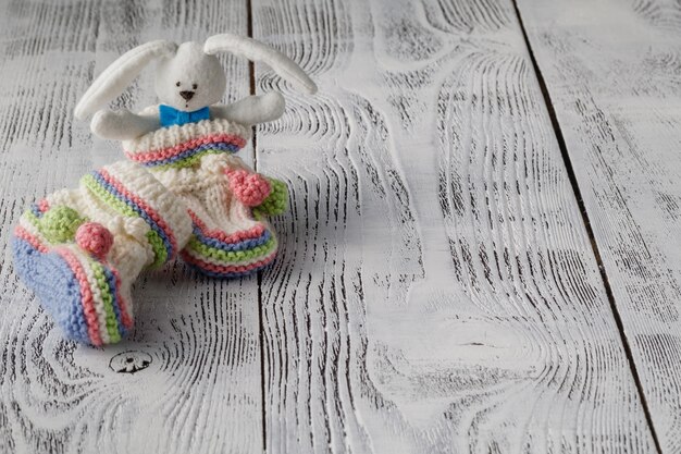 Baby accessories on table on light background