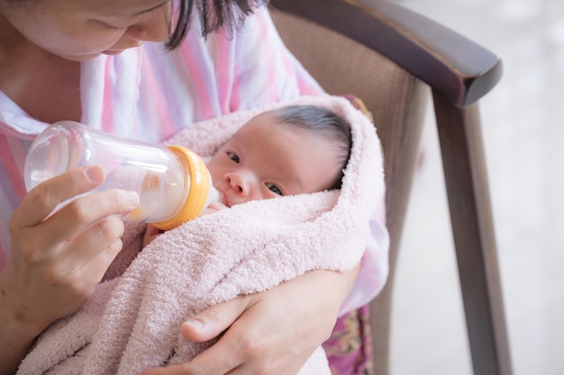 Baby and baby bottle