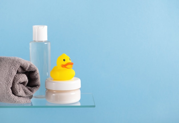 Baby bath accessories on glass surface