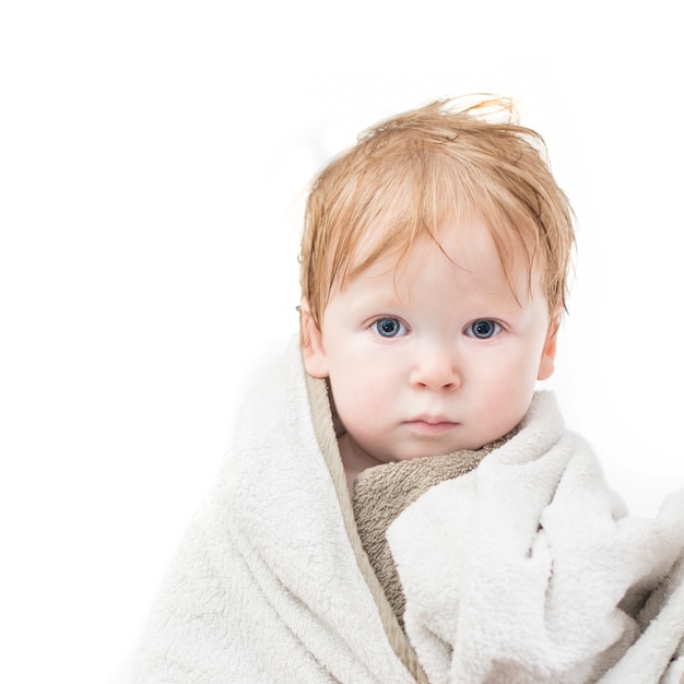 Baby bath portrait in towel