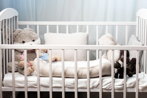 Baby bed with teddy bear baby happy childhood