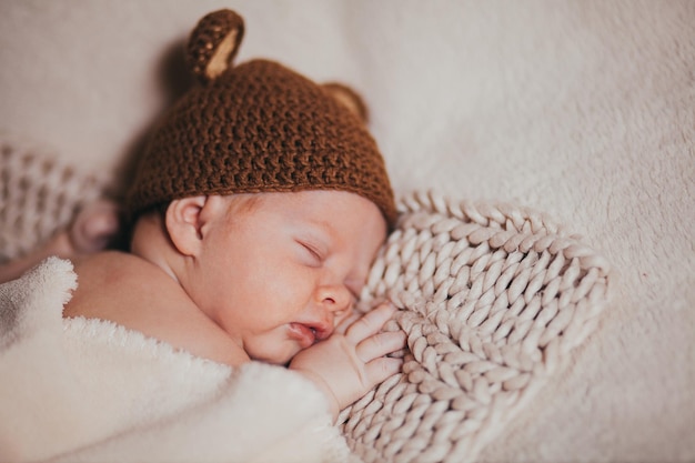 A baby on a blanket colorful bokeh on the background