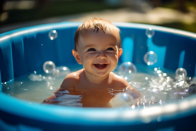 Baby in a blue tub smiling at the camera