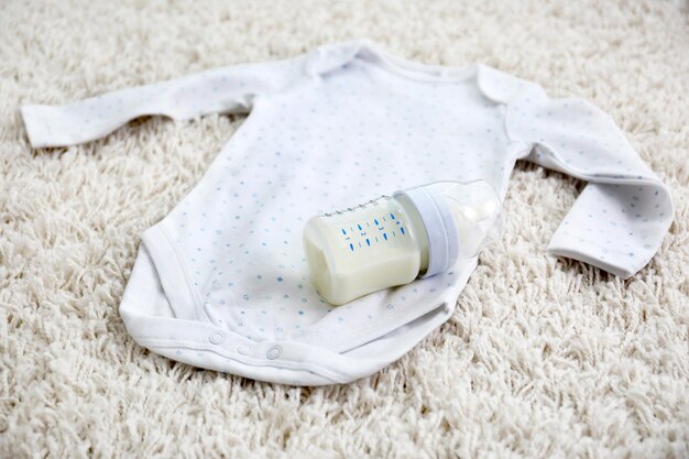 Photo baby body clothes on light background