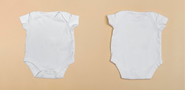 Baby body mockup, white on a colored background. Close up.