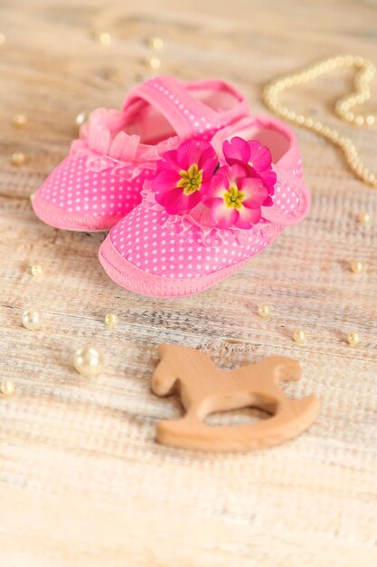 Baby booties accessories on a white background People