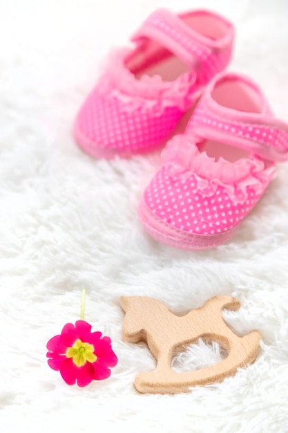 Baby booties accessories on a white background People