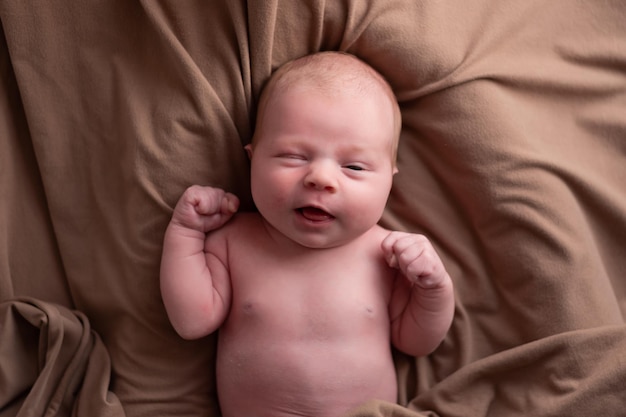 Baby boy posing for his first portrait